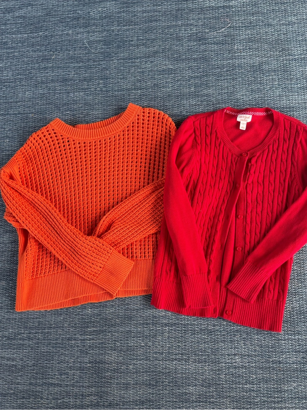 Cat & Jack Red Cable-Knit Cardigan and Orange Open-Weave Crewneck Sweaters
10/12